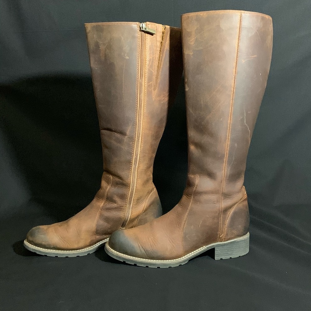 Tall brown leather boots